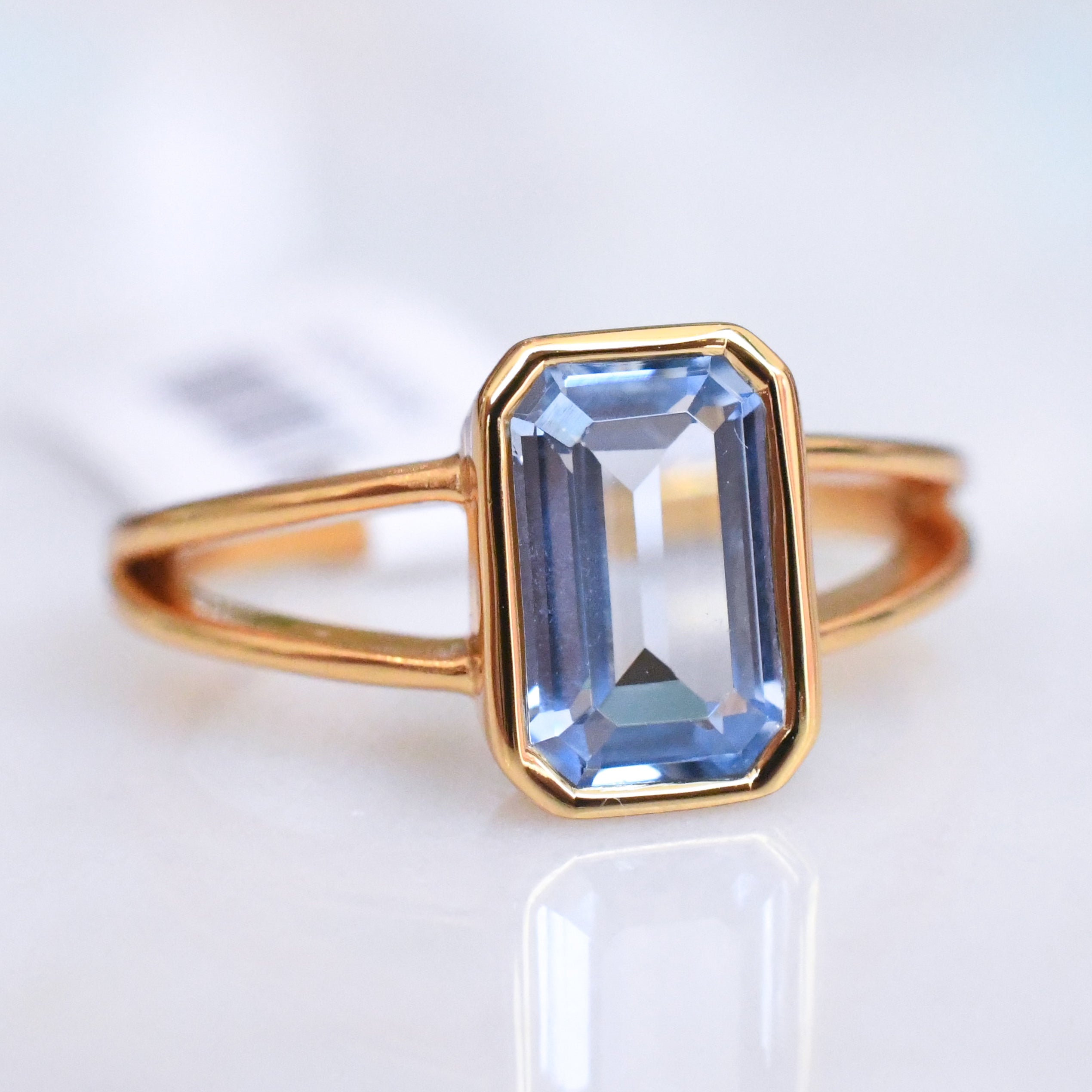 Split Band Light Blue Sapphire Ring - Gold Plated